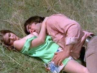 Guy Attempts to Tempt young woman in Meadow (1970s Vintage)